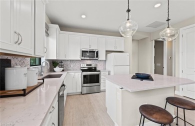 Enjoy low-maintenance, resort-style living in this beautifully on River Hall Country Club in Florida - for sale on GolfHomes.com, golf home, golf lot