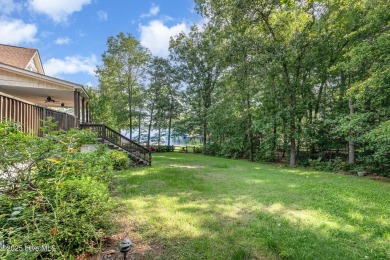 Experience lakeside living in this pristine 4 bed, 3 bath home on Seven Lakes Country Club in North Carolina - for sale on GolfHomes.com, golf home, golf lot