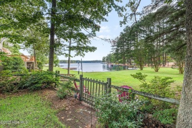 Experience lakeside living in this pristine 4 bed, 3 bath home on Seven Lakes Country Club in North Carolina - for sale on GolfHomes.com, golf home, golf lot
