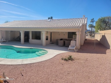 This gem of a home was built in 2000 and is a ''one owner home'' on London Bridge Golf Course in Arizona - for sale on GolfHomes.com, golf home, golf lot