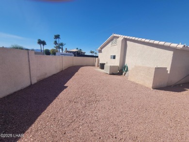 This gem of a home was built in 2000 and is a ''one owner home'' on London Bridge Golf Course in Arizona - for sale on GolfHomes.com, golf home, golf lot