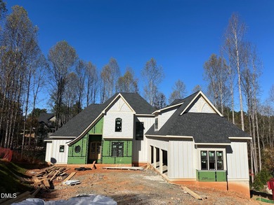 Discover elegance and comfort in this stunning new construction on Chapel Ridge Golf Club in North Carolina - for sale on GolfHomes.com, golf home, golf lot