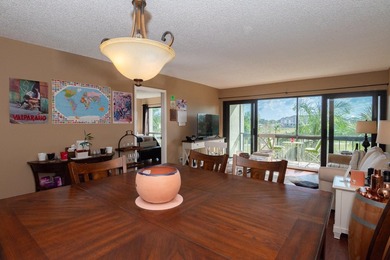 Enjoy the beautiful views of the palm trees in this cozy 2 on The President Country Club in Florida - for sale on GolfHomes.com, golf home, golf lot