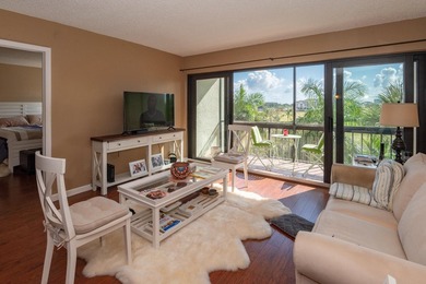 Enjoy the beautiful views of the palm trees in this cozy 2 on The President Country Club in Florida - for sale on GolfHomes.com, golf home, golf lot