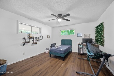 Welcome to this spacious one level 2,500 square foot home on Briarbrook Golf Course in Missouri - for sale on GolfHomes.com, golf home, golf lot
