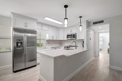 Step into luxury with this completely renovated 2-bed, 2-bath on Kings Point Golf -Flanders Way in Florida - for sale on GolfHomes.com, golf home, golf lot