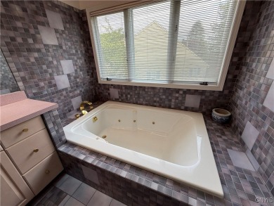 No showings until Friday 6/13/25 1pm. Spread out in this on Bellevue Country Club in New York - for sale on GolfHomes.com, golf home, golf lot