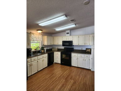 Welcome to this fabulous 2-bedroom / 2-bath home in the on Spanish Lakes Fairways in Florida - for sale on GolfHomes.com, golf home, golf lot