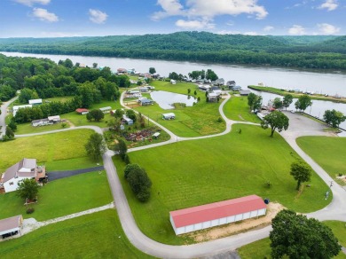 Welcome to your dream opportunity! This exceptional half acre on Tennessee River Golf Club in Tennessee - for sale on GolfHomes.com, golf home, golf lot