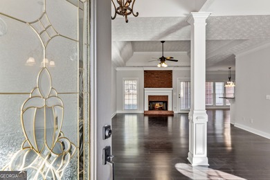 Discover this exquisite sprawling ranch home in the highly on Canongate At Georgia National Golf Club in Georgia - for sale on GolfHomes.com, golf home, golf lot