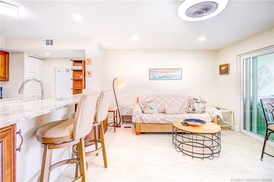 Escape the cold and live in paradise! Just a short walk to the on Ocean Club At the Hutchinson Island Beach Resort in Florida - for sale on GolfHomes.com, golf home, golf lot