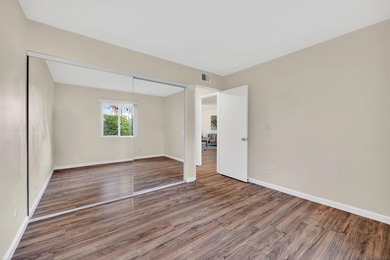 Ground-level ease, elevated living. Perfectly positioned as a on Lake San Marcos Country Club- South Course in California - for sale on GolfHomes.com, golf home, golf lot