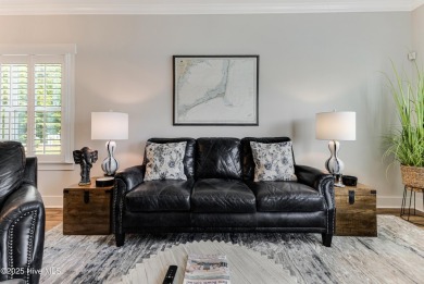 This gorgeous townhome resides in the Smithfield III section of on Brunswick Plantation and Golf Resorts in North Carolina - for sale on GolfHomes.com, golf home, golf lot