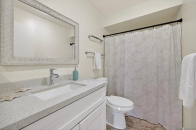 Ground-level ease, elevated living. Perfectly positioned as a on Lake San Marcos Country Club- South Course in California - for sale on GolfHomes.com, golf home, golf lot