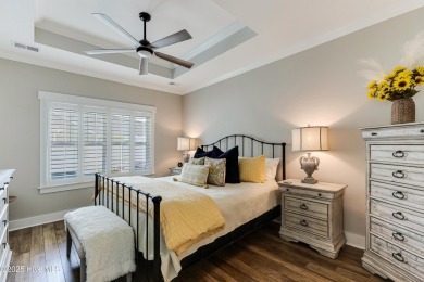 This gorgeous townhome resides in the Smithfield III section of on Brunswick Plantation and Golf Resorts in North Carolina - for sale on GolfHomes.com, golf home, golf lot