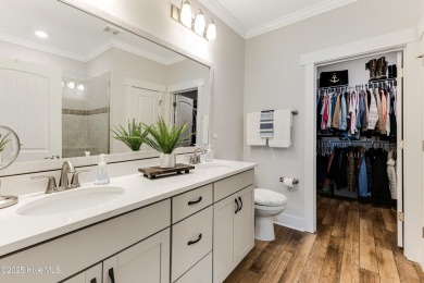 This gorgeous townhome resides in the Smithfield III section of on Brunswick Plantation and Golf Resorts in North Carolina - for sale on GolfHomes.com, golf home, golf lot