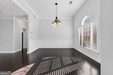 Discover this exquisite sprawling ranch home in the highly on Canongate At Georgia National Golf Club in Georgia - for sale on GolfHomes.com, golf home, golf lot