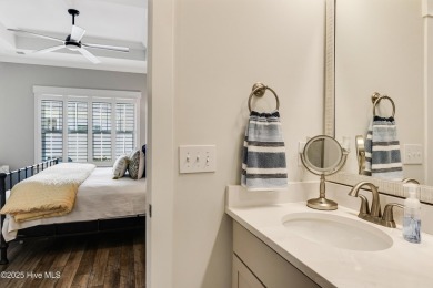 This gorgeous townhome resides in the Smithfield III section of on Brunswick Plantation and Golf Resorts in North Carolina - for sale on GolfHomes.com, golf home, golf lot