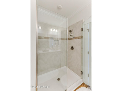 This gorgeous townhome resides in the Smithfield III section of on Brunswick Plantation and Golf Resorts in North Carolina - for sale on GolfHomes.com, golf home, golf lot