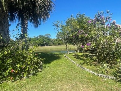 Beautiful Ballantrae home on very private large corner lot at on Santa Lucia River Club in Florida - for sale on GolfHomes.com, golf home, golf lot