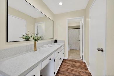 Ground-level ease, elevated living. Perfectly positioned as a on Lake San Marcos Country Club- South Course in California - for sale on GolfHomes.com, golf home, golf lot