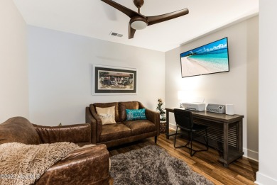 This gorgeous townhome resides in the Smithfield III section of on Brunswick Plantation and Golf Resorts in North Carolina - for sale on GolfHomes.com, golf home, golf lot