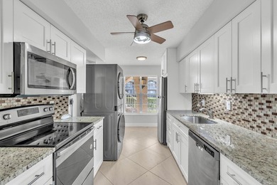 Beautifully updated and spacious 55+ ground-floor condo with no on Villa Del Ray Golf Club in Florida - for sale on GolfHomes.com, golf home, golf lot