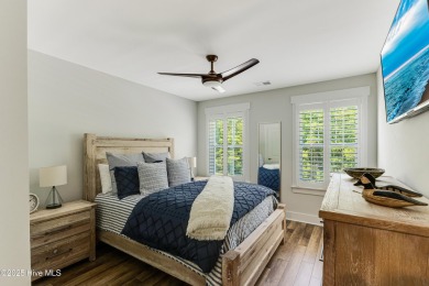 This gorgeous townhome resides in the Smithfield III section of on Brunswick Plantation and Golf Resorts in North Carolina - for sale on GolfHomes.com, golf home, golf lot