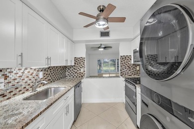 Beautifully updated and spacious 55+ ground-floor condo with no on Villa Del Ray Golf Club in Florida - for sale on GolfHomes.com, golf home, golf lot
