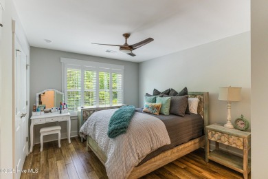 This gorgeous townhome resides in the Smithfield III section of on Brunswick Plantation and Golf Resorts in North Carolina - for sale on GolfHomes.com, golf home, golf lot