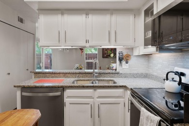 Beautifully Updated Townhouse located in the Villa Encantada on Arroyo Del Oso Golf Course in New Mexico - for sale on GolfHomes.com, golf home, golf lot