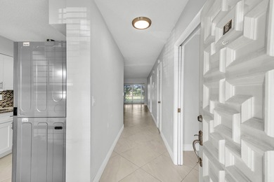 Beautifully updated and spacious 55+ ground-floor condo with no on Villa Del Ray Golf Club in Florida - for sale on GolfHomes.com, golf home, golf lot