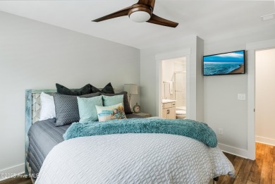This gorgeous townhome resides in the Smithfield III section of on Brunswick Plantation and Golf Resorts in North Carolina - for sale on GolfHomes.com, golf home, golf lot
