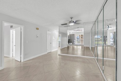 Beautifully updated and spacious 55+ ground-floor condo with no on Villa Del Ray Golf Club in Florida - for sale on GolfHomes.com, golf home, golf lot