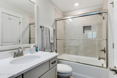 This gorgeous townhome resides in the Smithfield III section of on Brunswick Plantation and Golf Resorts in North Carolina - for sale on GolfHomes.com, golf home, golf lot