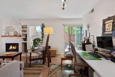 Beautifully Updated Townhouse located in the Villa Encantada on Arroyo Del Oso Golf Course in New Mexico - for sale on GolfHomes.com, golf home, golf lot