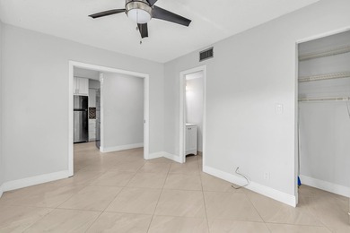 Beautifully updated and spacious 55+ ground-floor condo with no on Villa Del Ray Golf Club in Florida - for sale on GolfHomes.com, golf home, golf lot