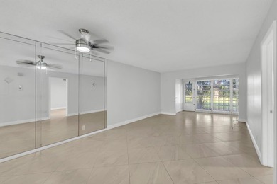 Beautifully updated and spacious 55+ ground-floor condo with no on Villa Del Ray Golf Club in Florida - for sale on GolfHomes.com, golf home, golf lot