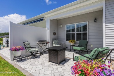 This gorgeous townhome resides in the Smithfield III section of on Brunswick Plantation and Golf Resorts in North Carolina - for sale on GolfHomes.com, golf home, golf lot