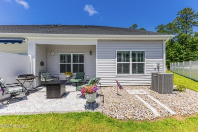 This gorgeous townhome resides in the Smithfield III section of on Brunswick Plantation and Golf Resorts in North Carolina - for sale on GolfHomes.com, golf home, golf lot