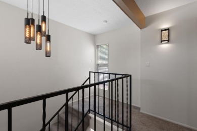Beautifully Updated Townhouse located in the Villa Encantada on Arroyo Del Oso Golf Course in New Mexico - for sale on GolfHomes.com, golf home, golf lot