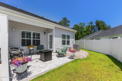 This gorgeous townhome resides in the Smithfield III section of on Brunswick Plantation and Golf Resorts in North Carolina - for sale on GolfHomes.com, golf home, golf lot