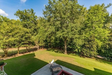 Discover elegance in this spacious Jones Creek ranch with a full on Jones Creek Golf Club in Georgia - for sale on GolfHomes.com, golf home, golf lot