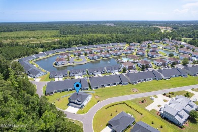 This gorgeous townhome resides in the Smithfield III section of on Brunswick Plantation and Golf Resorts in North Carolina - for sale on GolfHomes.com, golf home, golf lot