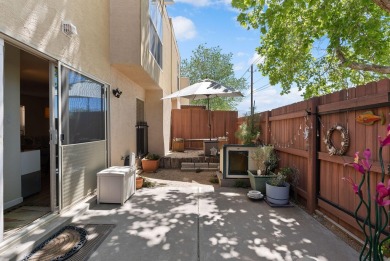 Beautifully Updated Townhouse located in the Villa Encantada on Arroyo Del Oso Golf Course in New Mexico - for sale on GolfHomes.com, golf home, golf lot