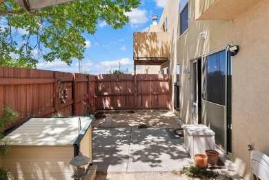 Beautifully Updated Townhouse located in the Villa Encantada on Arroyo Del Oso Golf Course in New Mexico - for sale on GolfHomes.com, golf home, golf lot
