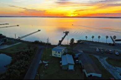 Wake up to breathtaking waterfront sunrises every day with epic on Lamar Golf Course in Texas - for sale on GolfHomes.com, golf home, golf lot