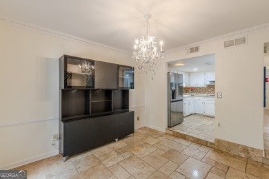 Welcome to this beautifully maintained all-brick townhome that on Dunwoody Country Club in Georgia - for sale on GolfHomes.com, golf home, golf lot