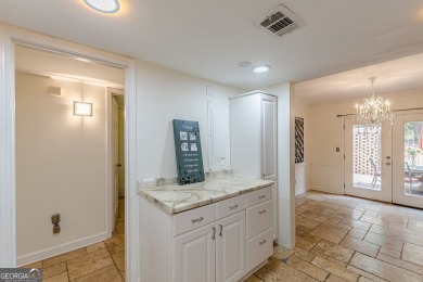 Welcome to this beautifully maintained all-brick townhome that on Dunwoody Country Club in Georgia - for sale on GolfHomes.com, golf home, golf lot