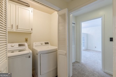 Welcome to this beautifully maintained all-brick townhome that on Dunwoody Country Club in Georgia - for sale on GolfHomes.com, golf home, golf lot